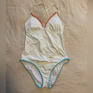 White one piece with crochet detail